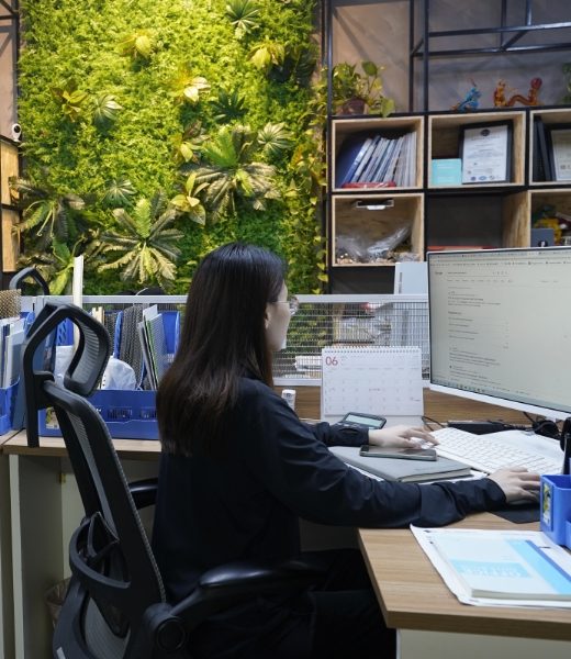 Our employees sit at their chairs and work hard.